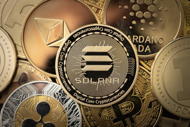 solana-sol-cryptocurrency-physical-coin-on-top-of-other-cryptocurrencies
